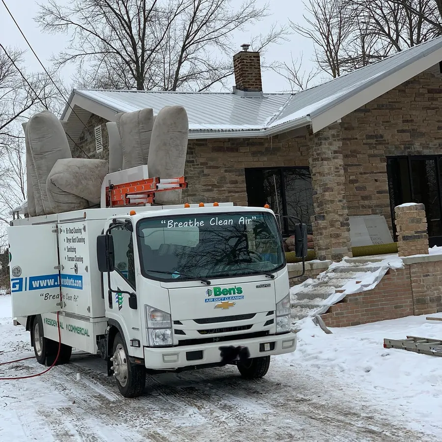 The Ben's Air Duct Cleaning truck at a winter job outside a Northeast Ohio home