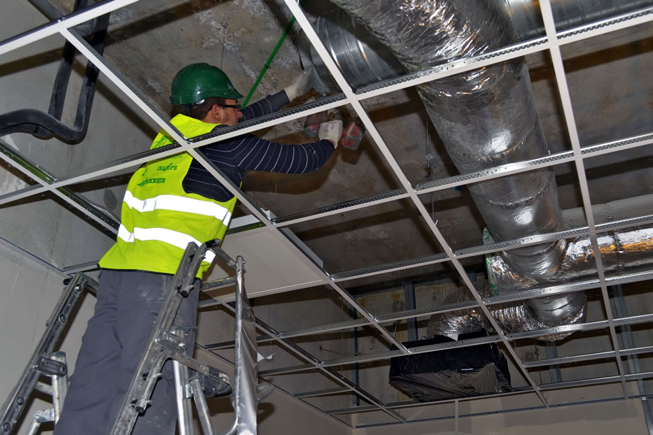 Technician Cleaning Commercial Air Ducts